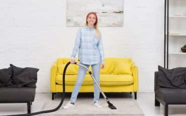 woman-cleaning-with-vacuum-cleaner