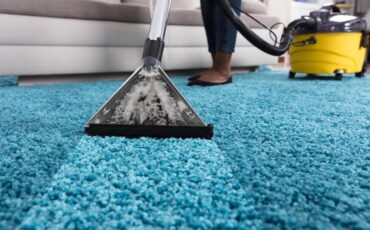 imgi_47_person-using-vacuum-cleaner-cleaning-carpet_1016675-2735