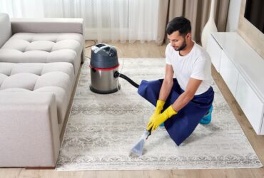 imgi_49_man-cleaning-carpet-living-room-using-vacuum-cleaner-home_130111-3883 Carpet Cleaning
